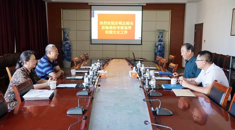 解放军总医院杏林书画院庄明正院长来红足—世官网参观交流