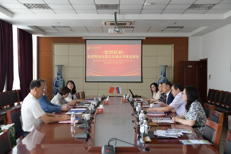 俄罗斯远东国立交通大学校长Буровцев Владимир Викторович一行来红足—世官网访问交流